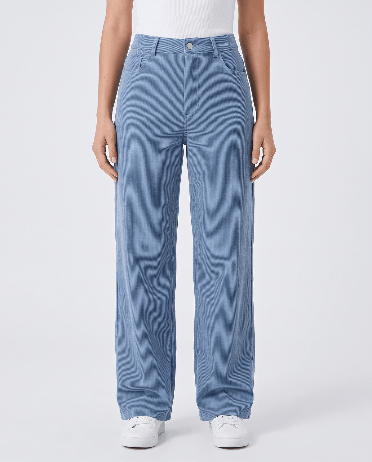 Straight-on front view of light blue cord trousers with button fly, belt loops and front pockets