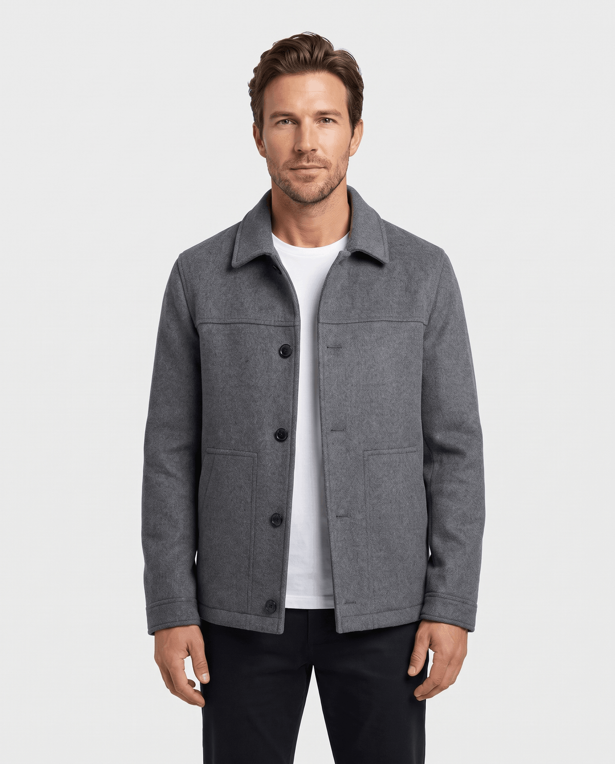 Model in a gray jacket and dark trousers, arms relaxed at the sides