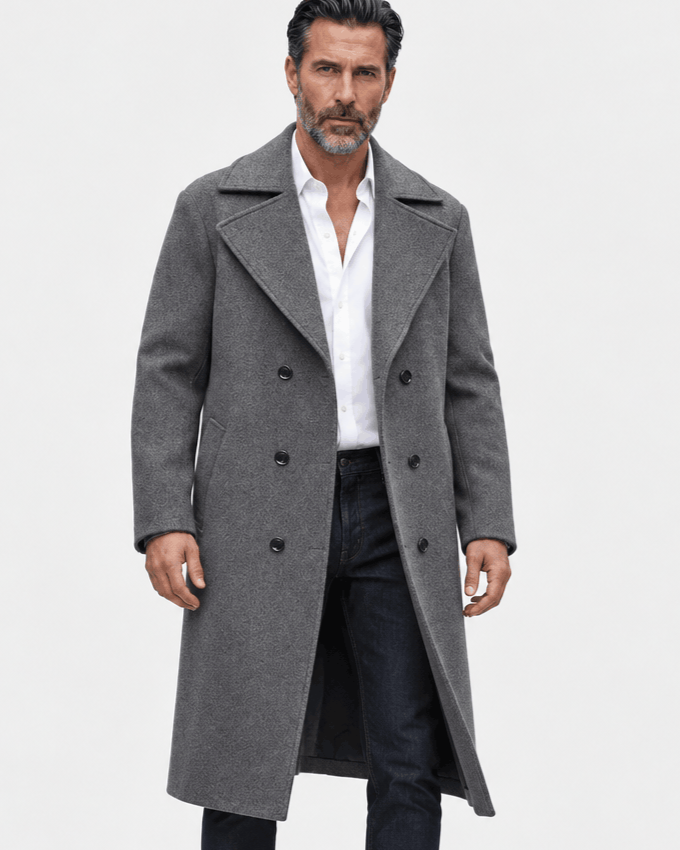 Dark gray double-breasted overcoat worn open over a white shirt and dark jeans, front view