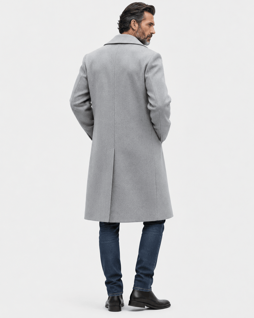 Back of the light gray long overcoat showing a clean shoulder line and straight hem with jeans