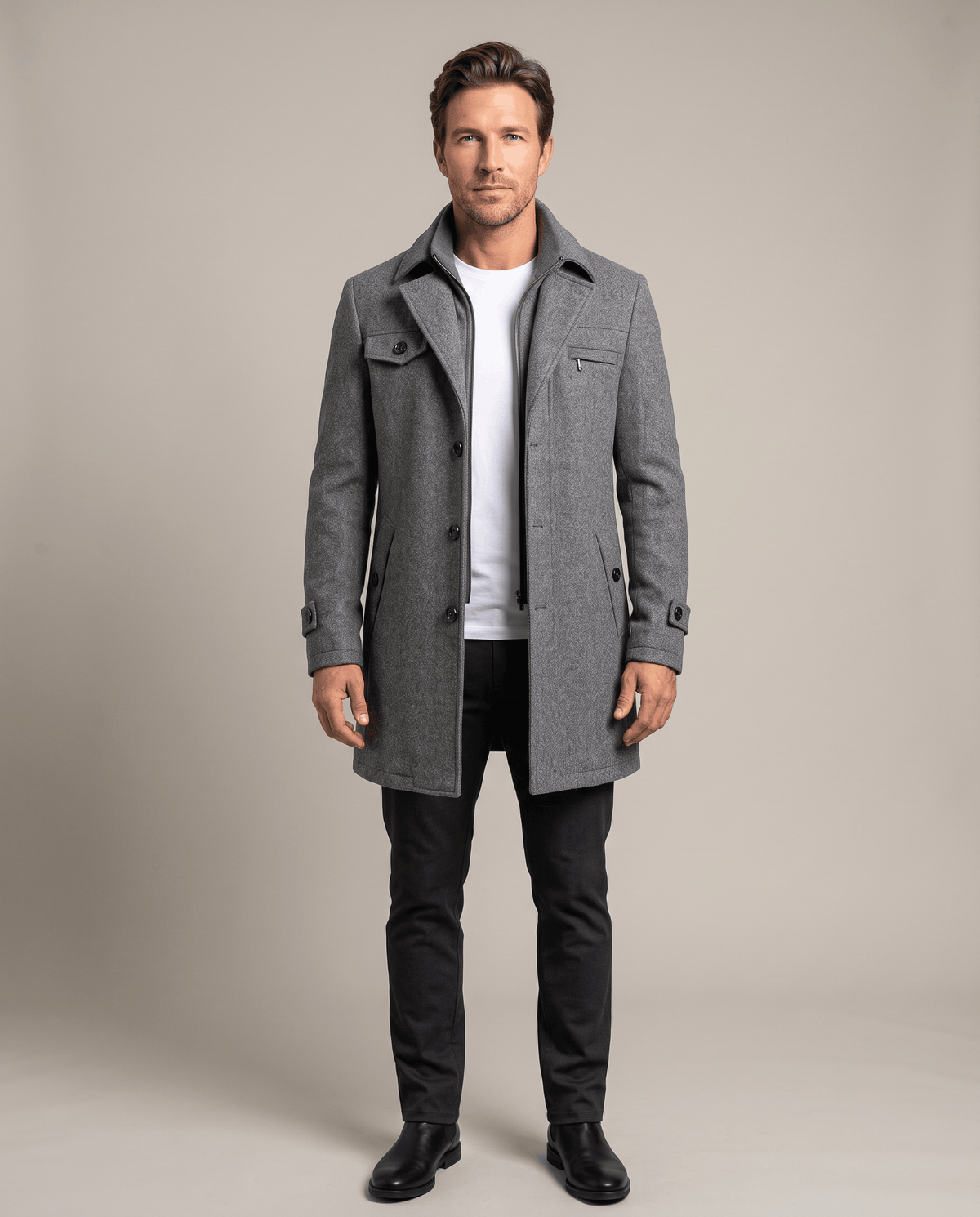 Front view of the gray overcoat buttoned over a white tee and dark trousers