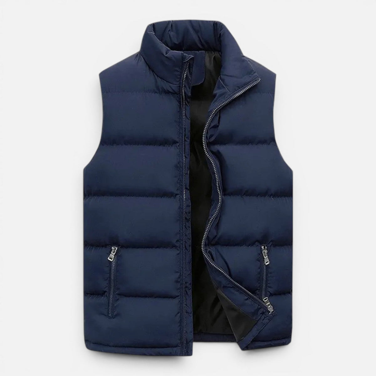 Navy quilted vest laid flat with front open, showing zippered pockets and dark lining