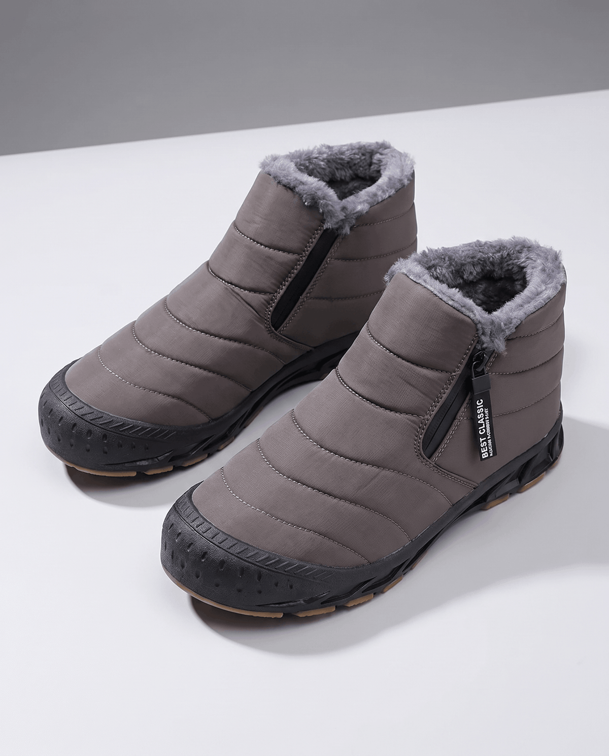 Pair of gray insulated ankle boots shown together.
