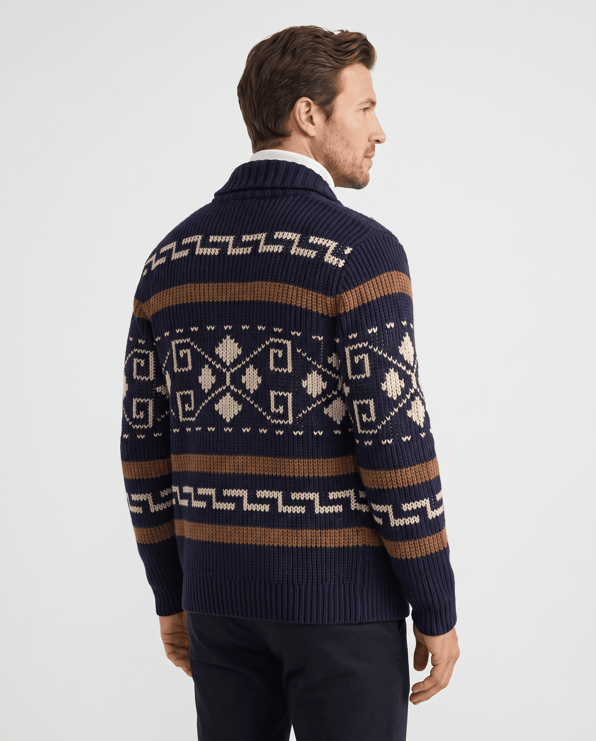 Back view of navy blue geometric jacquard cardigan with brown stripes