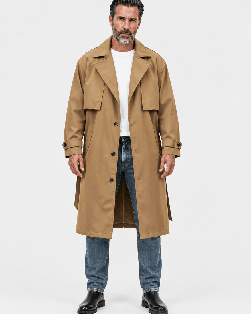 Brown longline coat worn buttoned over a white tee and jeans, full-length front view in studio