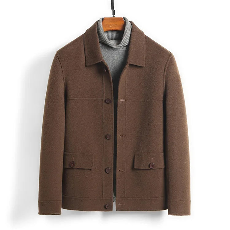 Dark brown jacket on a hanger front view with both flap pockets buttoned