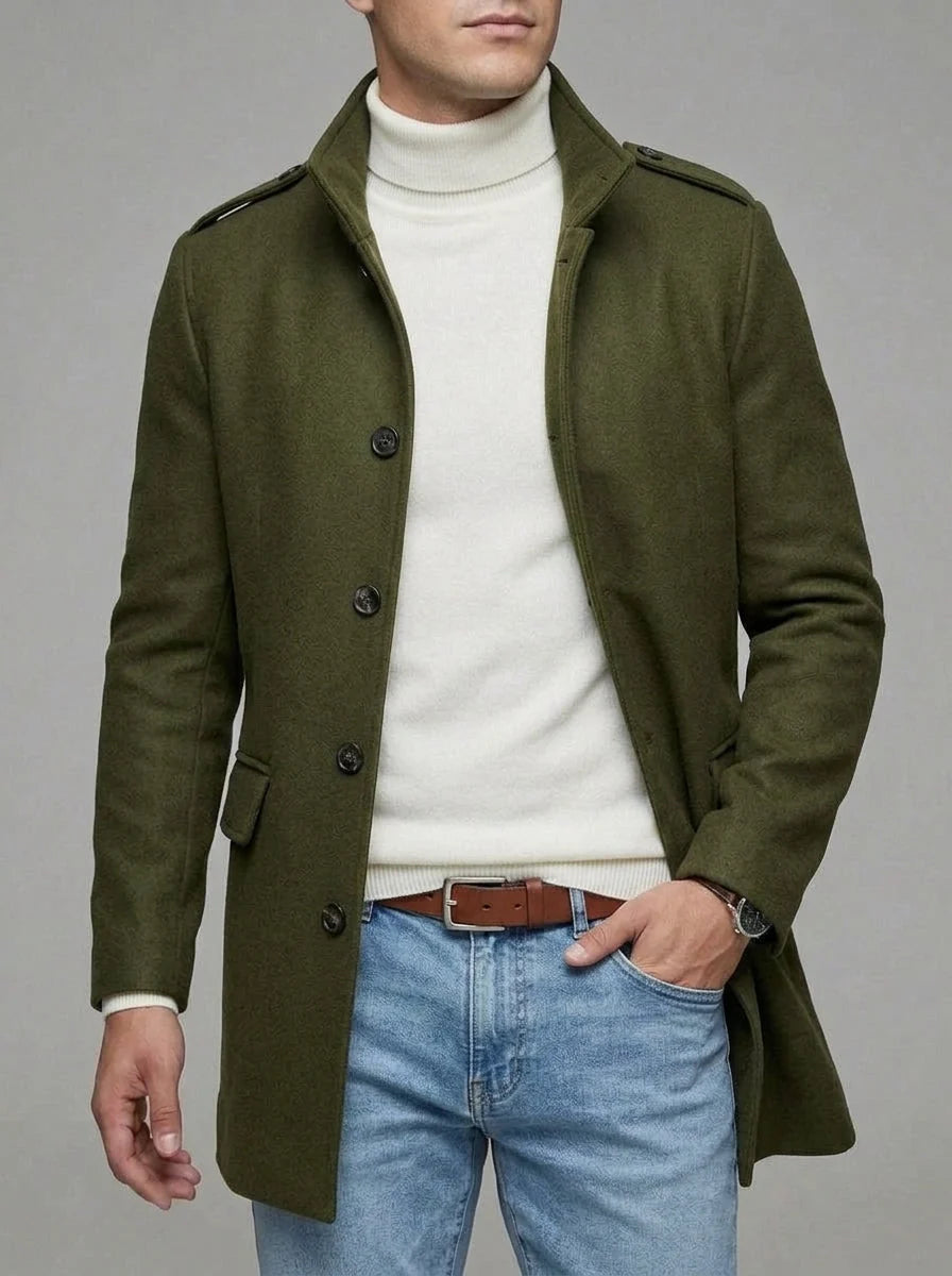 Army green overcoat front detail with buttons and epaulettes, worn over a white turtleneck