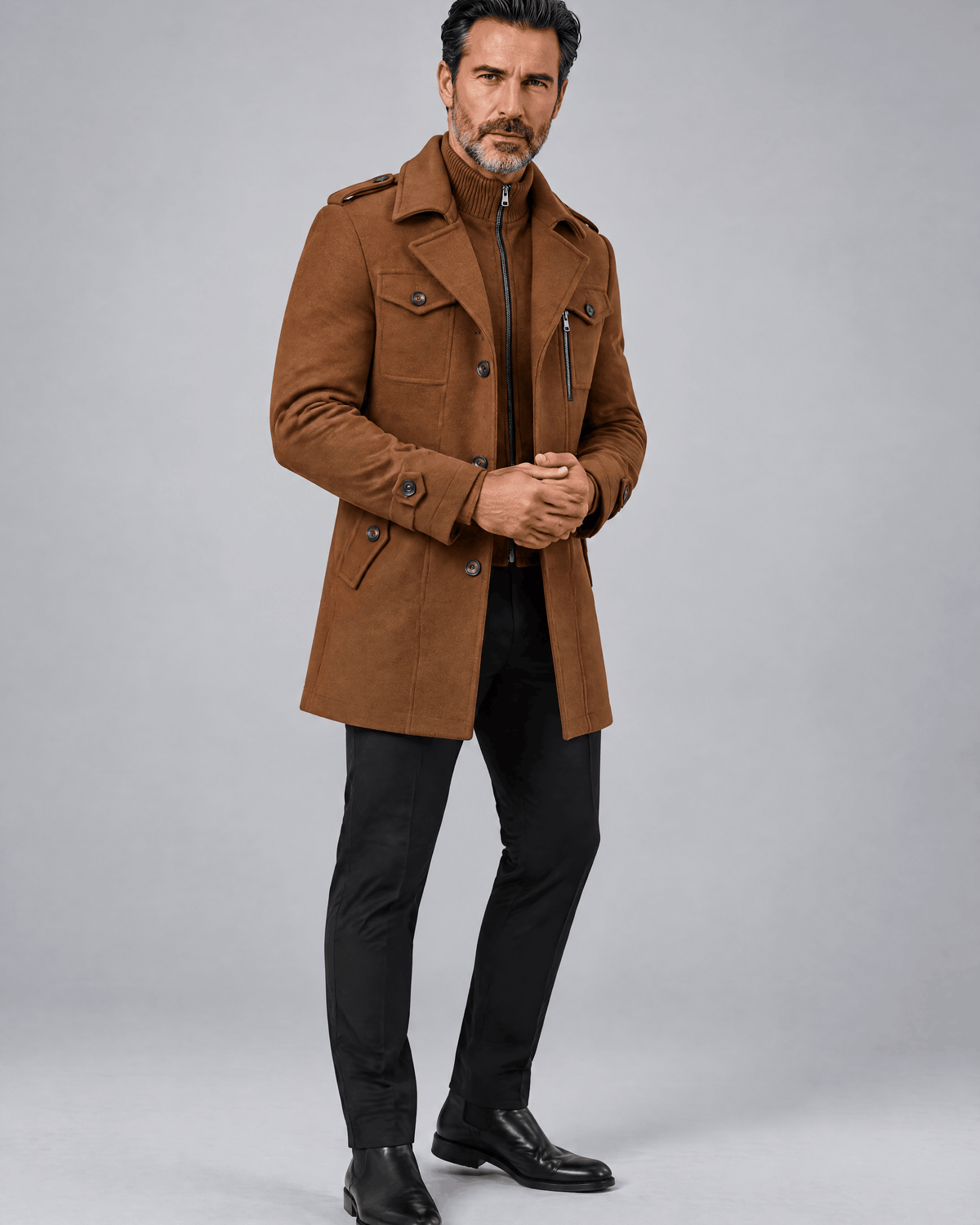 Caramel thigh-length coat in a three-quarter view with dark trousers and black shoes
