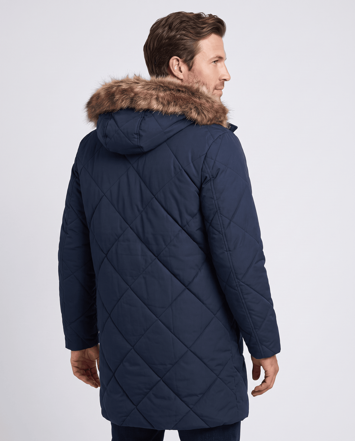 Men's navy blue quilted long parka, back view