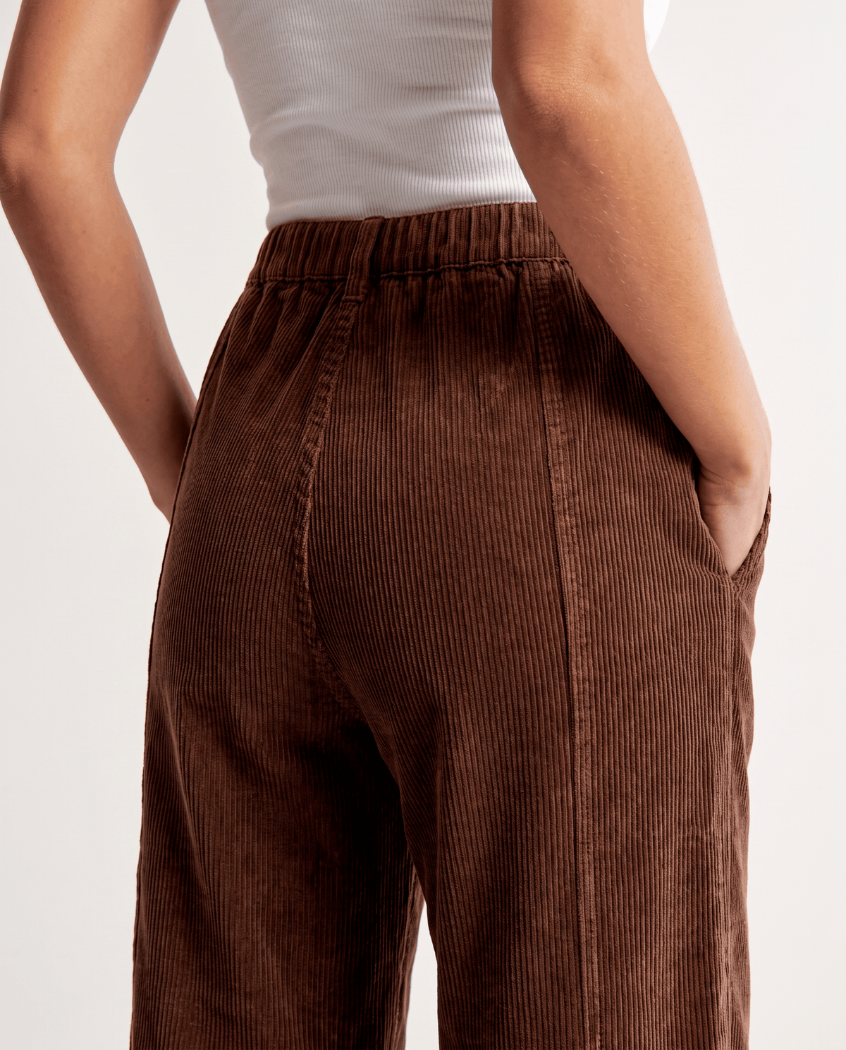 Back close-up of brown wide-rib corduroy with an elastic back waistband