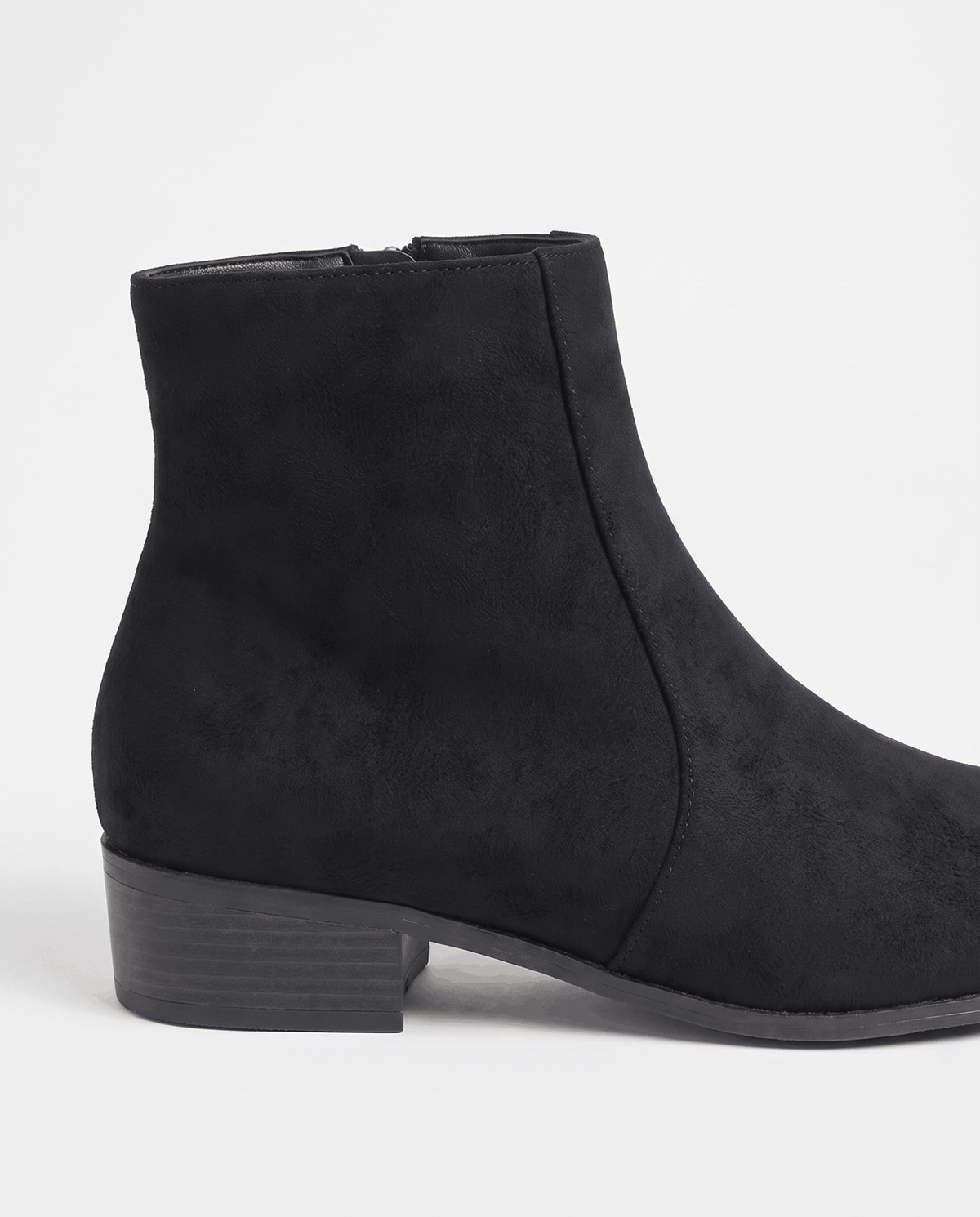 Single black suede-look ankle boot showing the side zip and heel