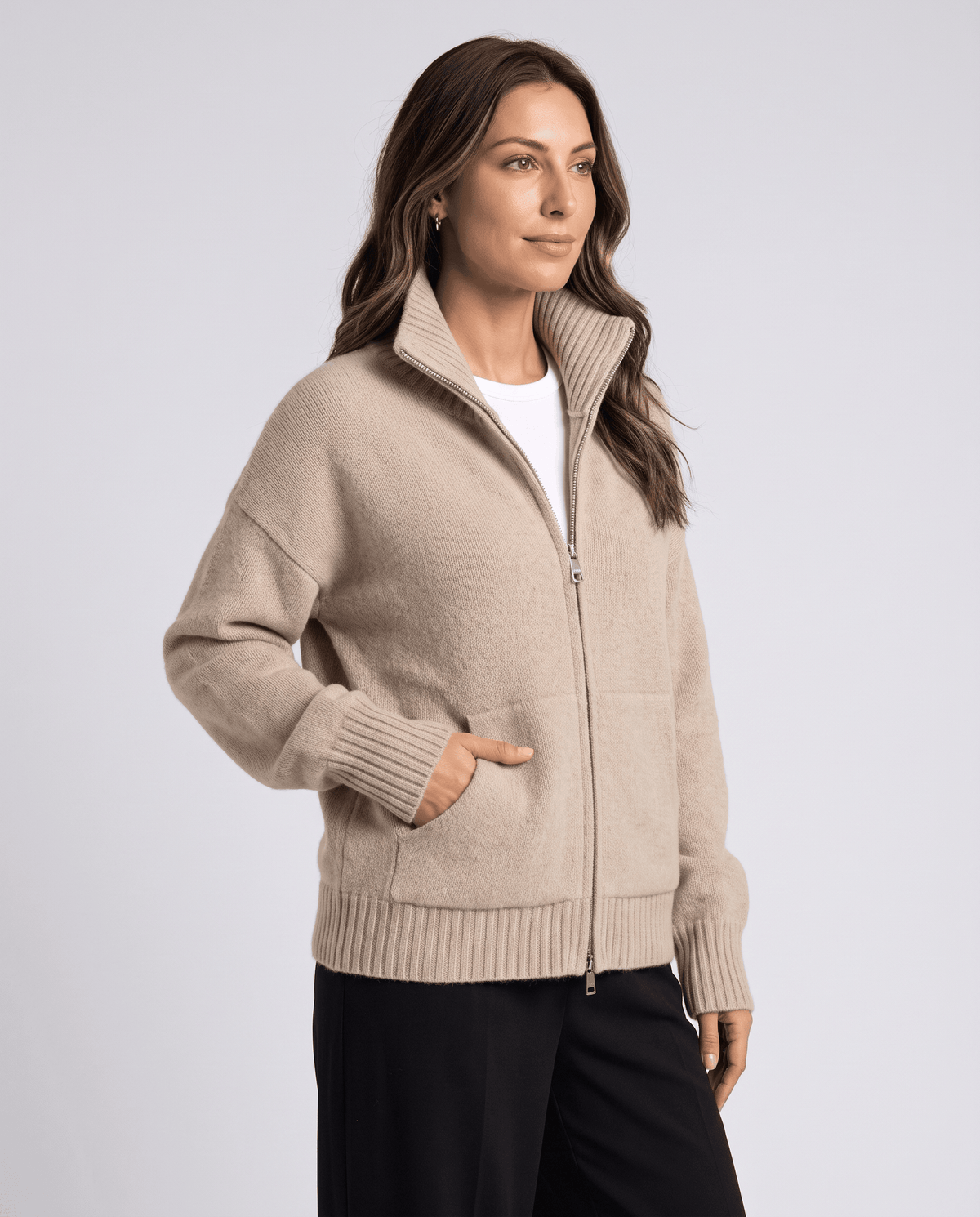 Beige funnel neck cardigan with full front zip, three-quarter view