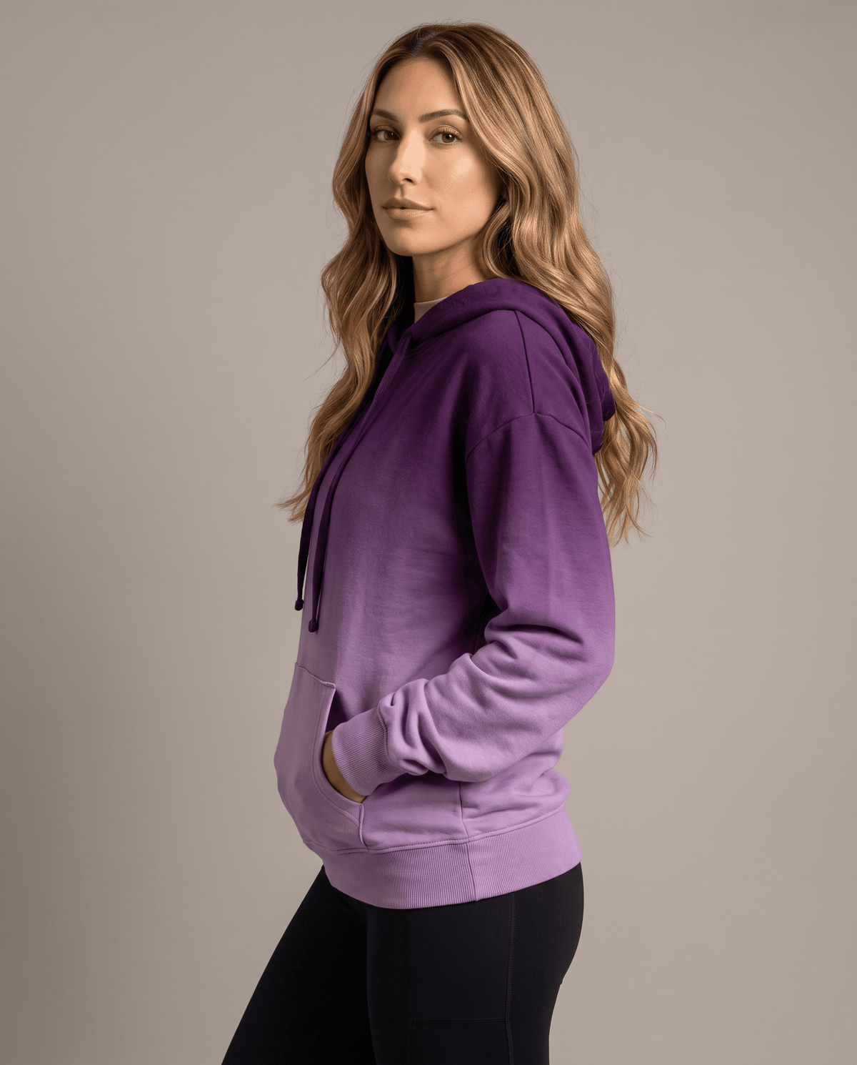 Side angle of the purple ombre hoodie showing the hood and fade toward the hem