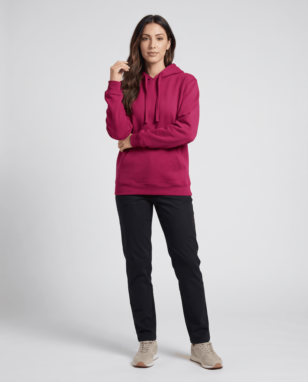 Full-length look pairing the red hoodie with black pants