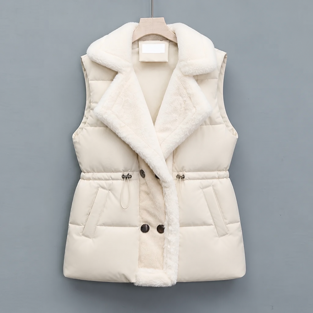Ivory padded vest with plush collar and drawstring waist on a hanger