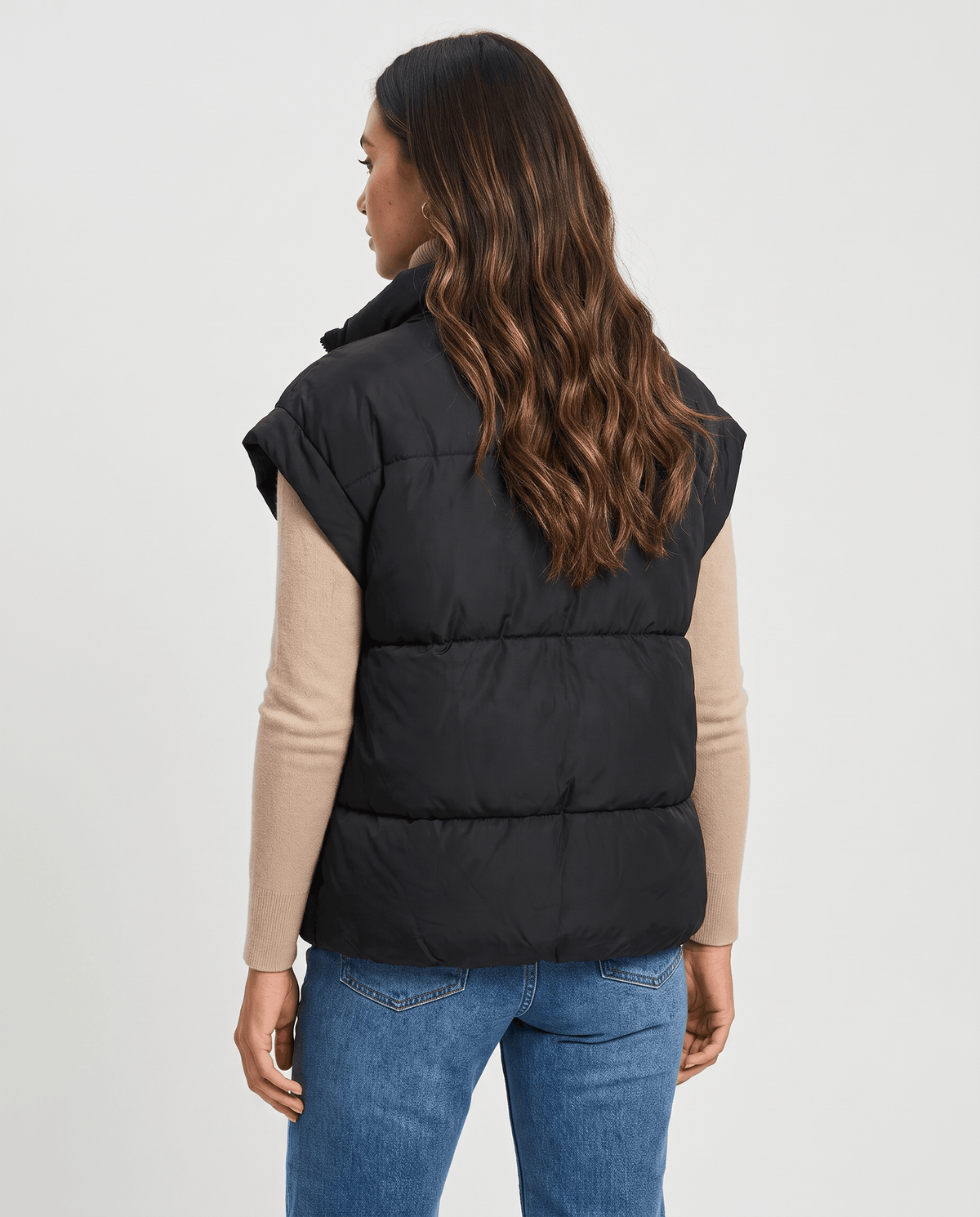Back view of black padded sleeveless vest with horizontal padded sections