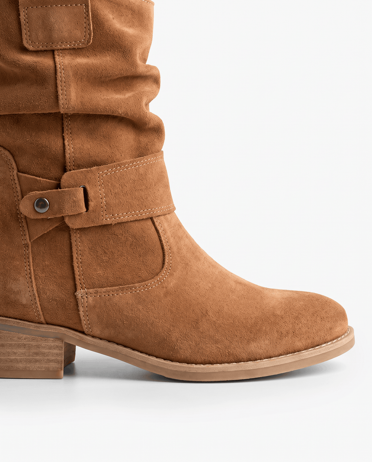 Close-up of the tan suede boot, low heel and round toe