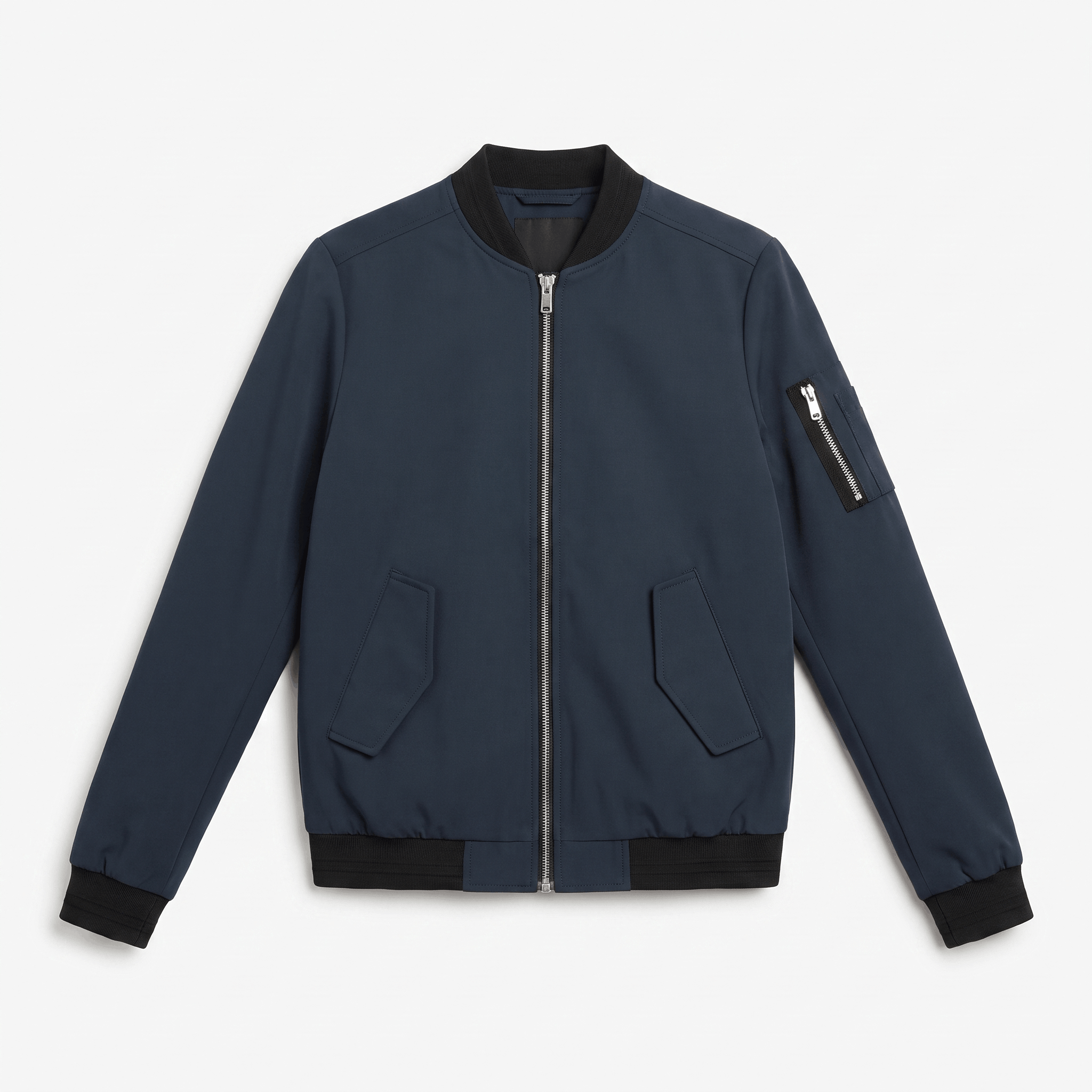 Navy blue bomber jacket with a full front zipper, ribbed trim, zippered side pockets, and a zippered sleeve pocket.