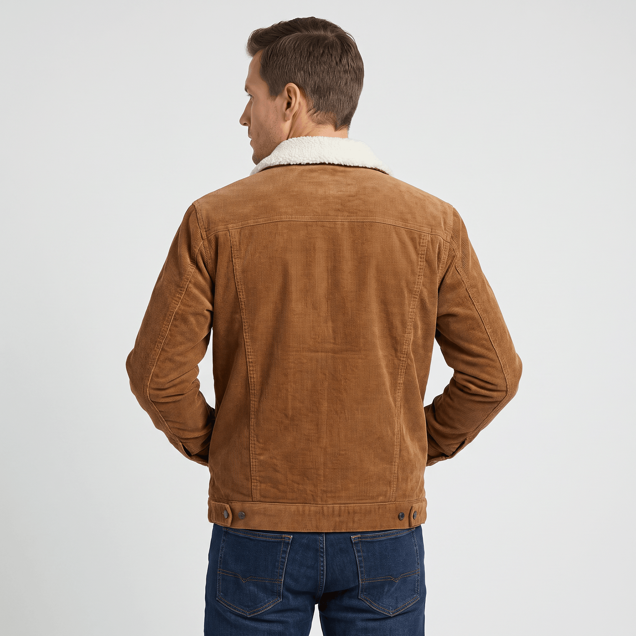 Brown corduroy trucker jacket featuring a soft sherpa collar and regular fit silhouette.