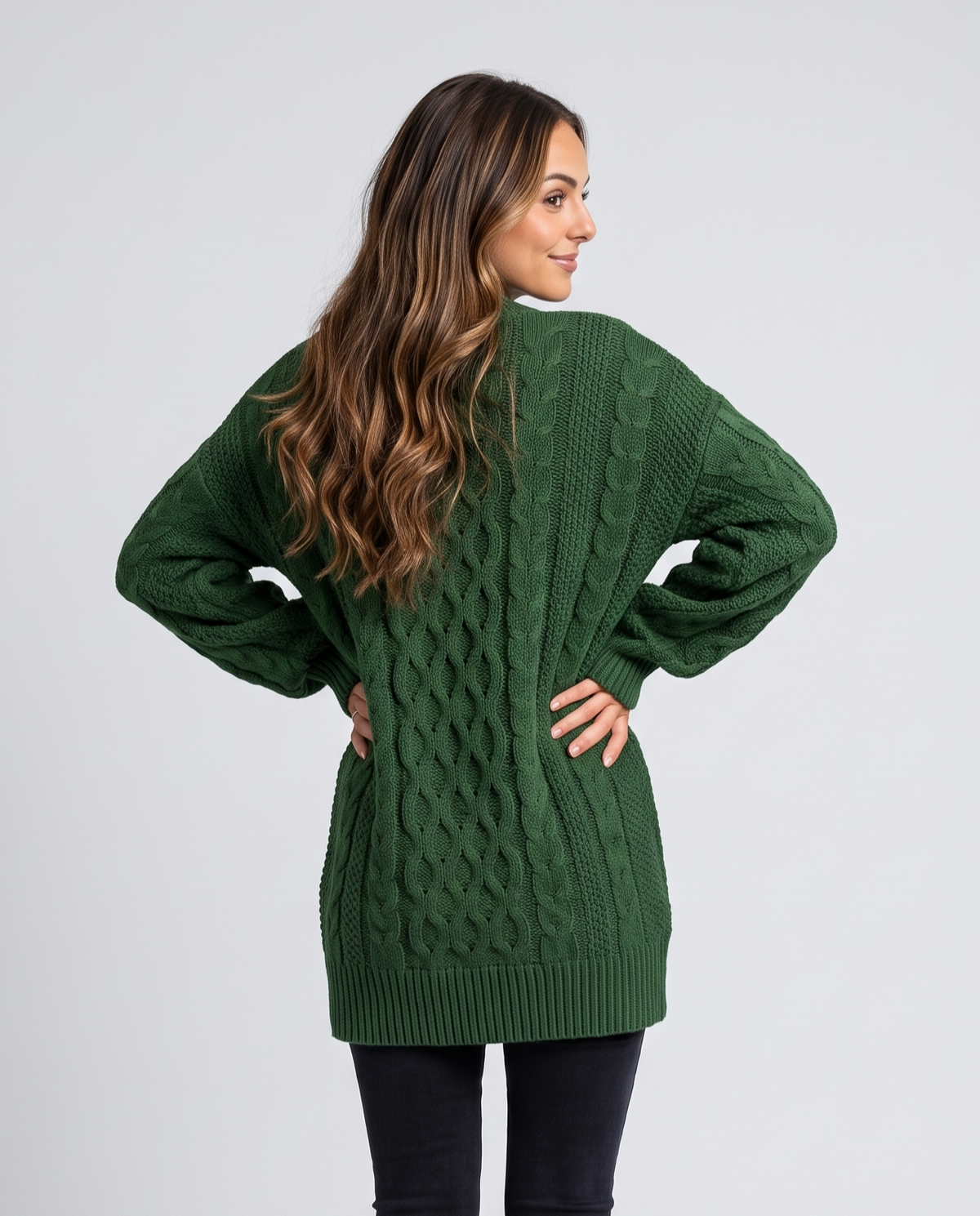 Green Cable Knit Sweater worn by a female model, featuring an oversized fit, textured cable knit pattern, long balloon sleeves, and relaxed silhouette.