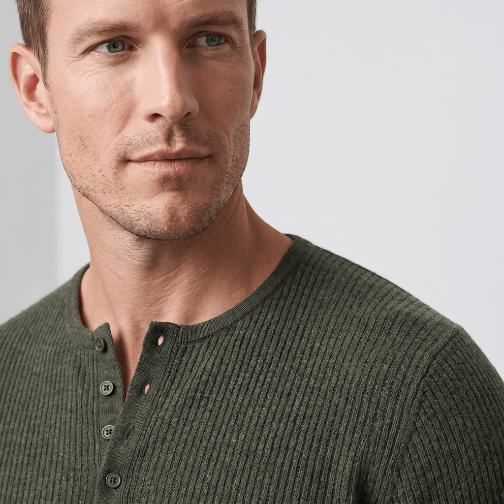 Olive green ribbed knit henley sweater featuring a four-button placket and a regular fit in a soft, textured fabric.
