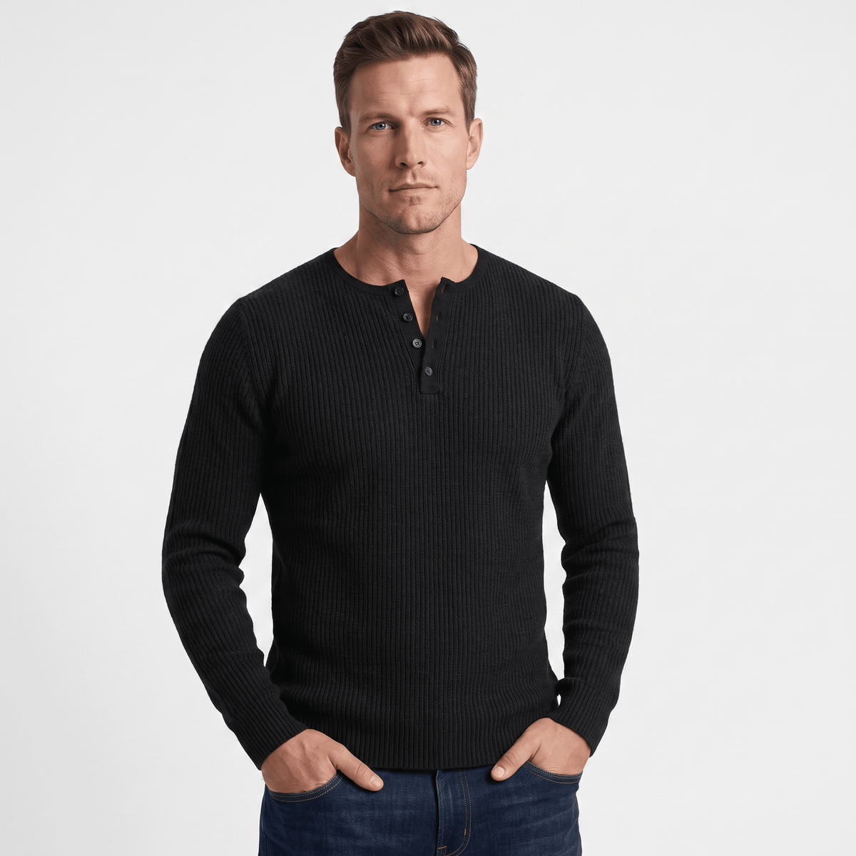 Black ribbed knit henley sweater featuring a four-button placket and a regular fit, worn with dark denim jeans.