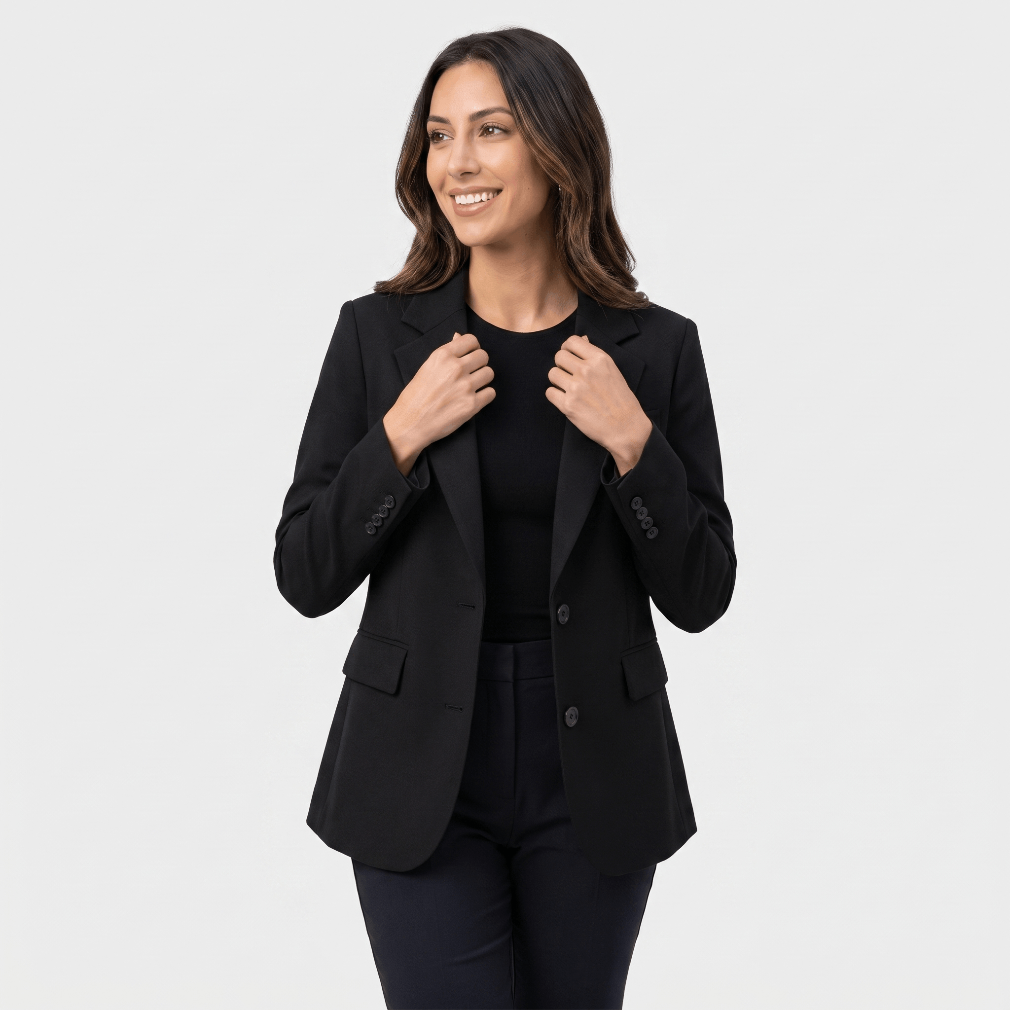 Female model wearing a black tailored blazer with notched lapels and a single-button closure.