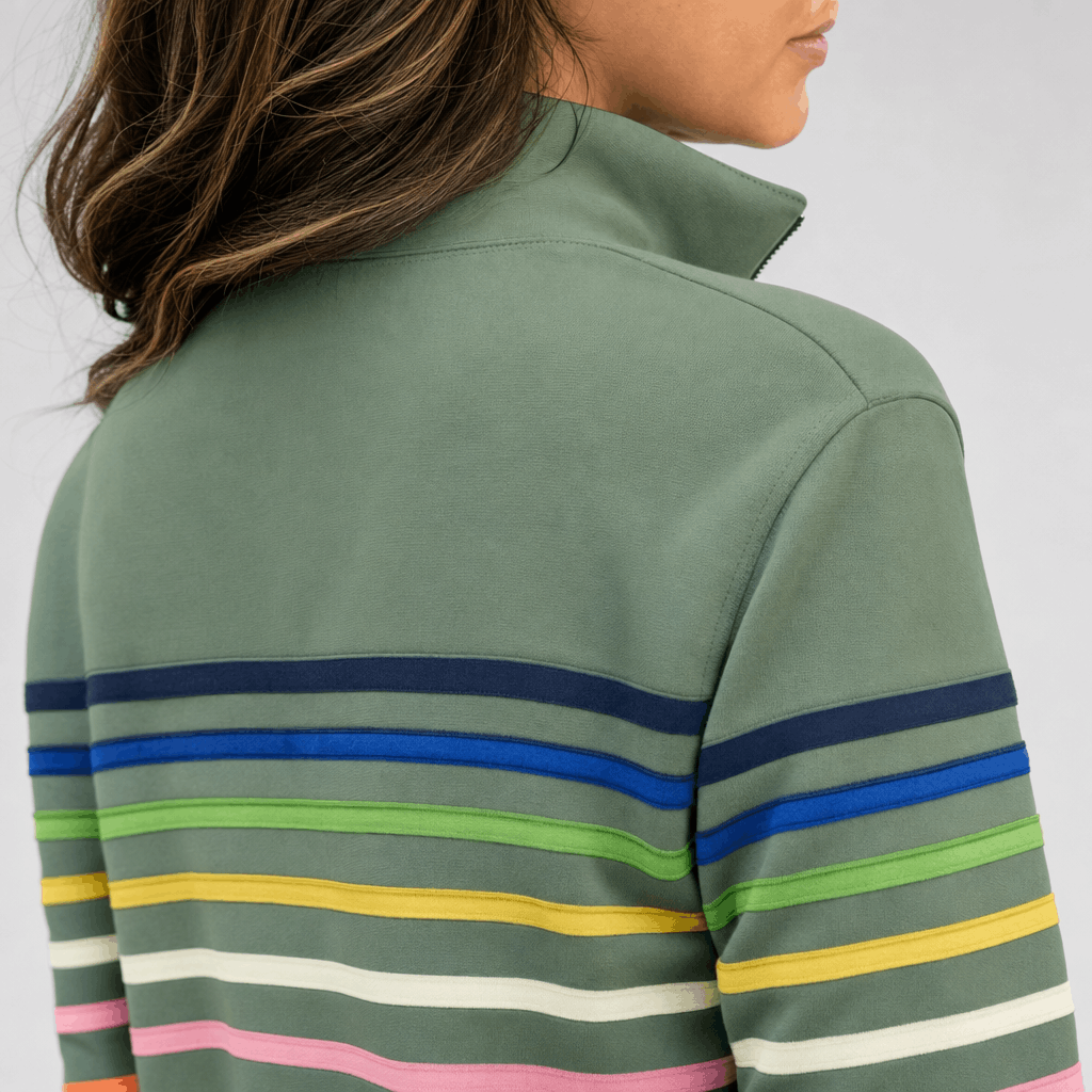 Back and side view of the sage green sweater, showing the raised collar and colorful stripe pattern across the upper back and sleeves.