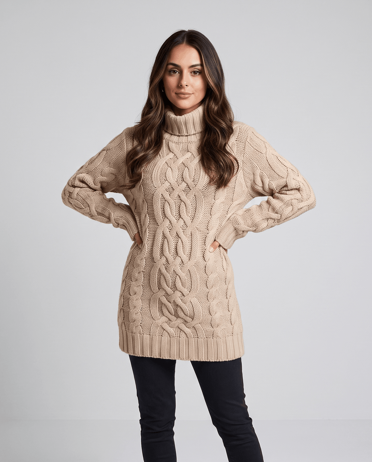 Beige Chunky Cable Knit Sweater worn by a female model, featuring a turtleneck, textured cable knit pattern, long sleeves, and ribbed trim.