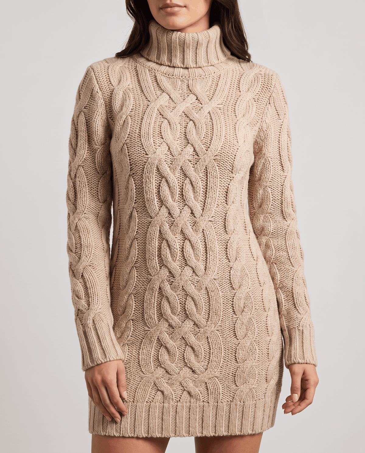 Beige Chunky Cable Knit Sweater worn by a female model, shown from the front with a turtleneck, textured cable knit pattern, long sleeves, and ribbed trim.