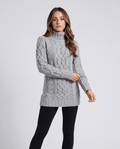 Gray Chunky Cable Knit Sweater worn by a female model, featuring a turtleneck, textured cable knit pattern, long sleeves, and ribbed trim.