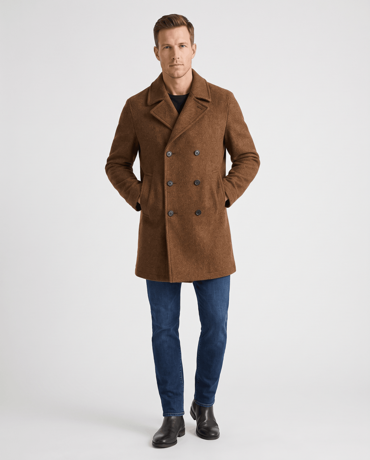 A man wearing a brown classic double-breasted trench coat with a longline fit and tailored lapels