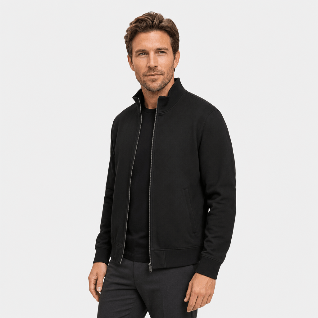 Male model wearing a black zip-up jacket with a stand collar.