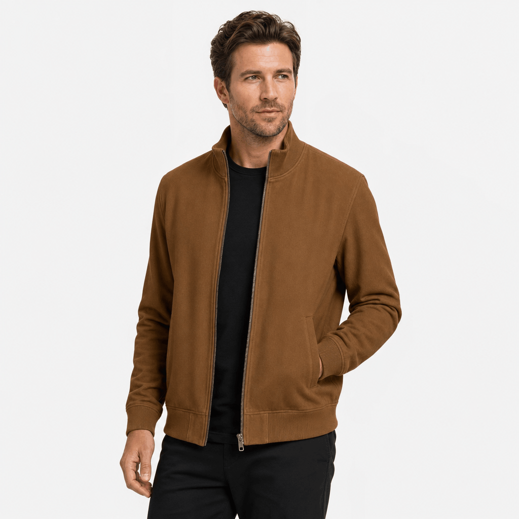 Male model wearing a camel brown zip-up jacket with a stand collar and side pockets.