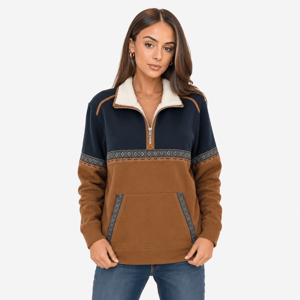 Woman modeling the color-block half-zip pullover in a front-facing standing pose.