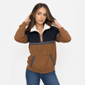 Woman wearing a color-block half-zip pullover with a navy upper panel, brown sleeves and lower body, and blue jeans, shown adjusting the collar.