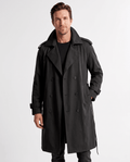 Black double-breasted trench coat with wide lapels, shoulder epaulettes, and cuff straps worn by a male model