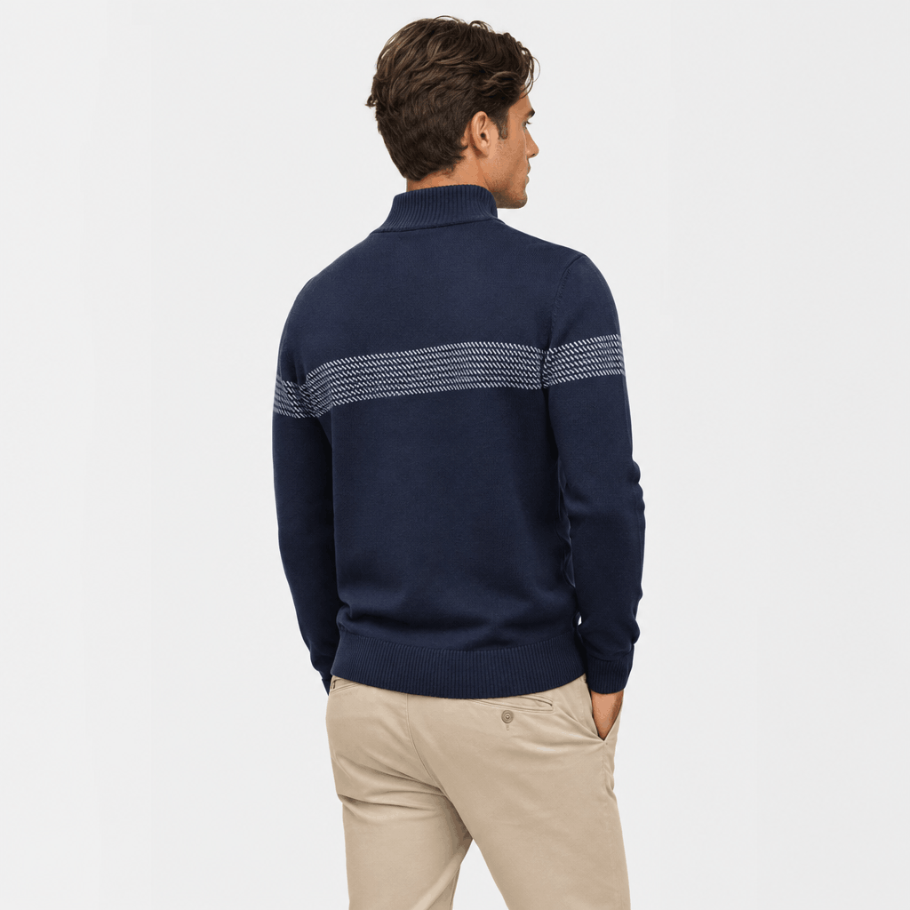 Back view of the dark navy quarter-zip sweater, showing the textured knit fabric and contrasting chest stripe wrapping around the upper body.