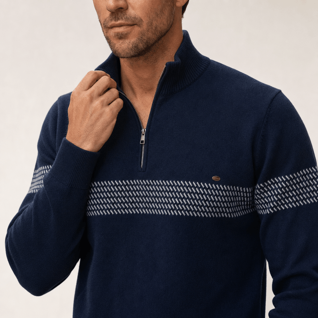 Close-up side view of the dark navy sweater, highlighting the ribbed knit texture and textured horizontal stripe.