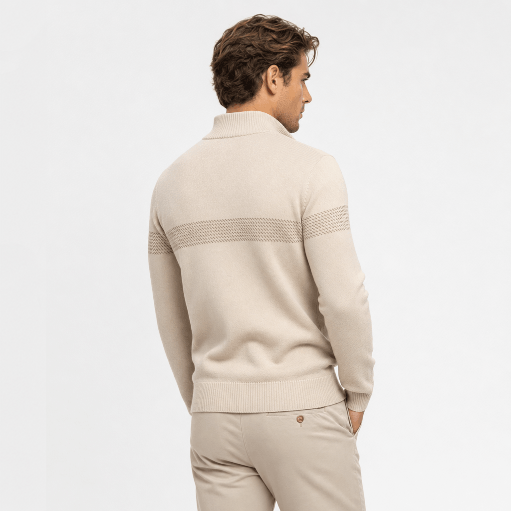 Male model shown from the back wearing the beige textured quarter-zip sweater and matching trousers.