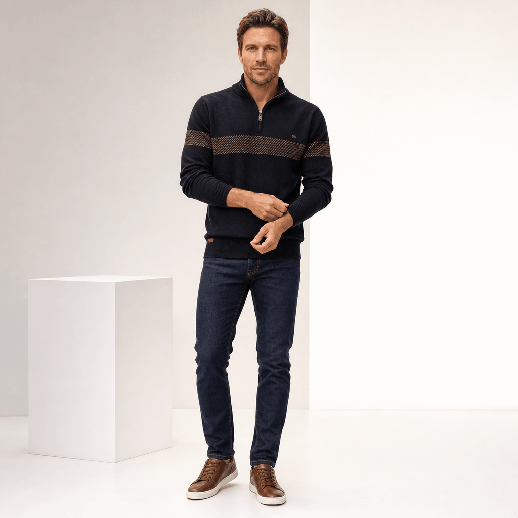 Full-body view of a male model wearing the black quarter-zip sweater with beige trousers.