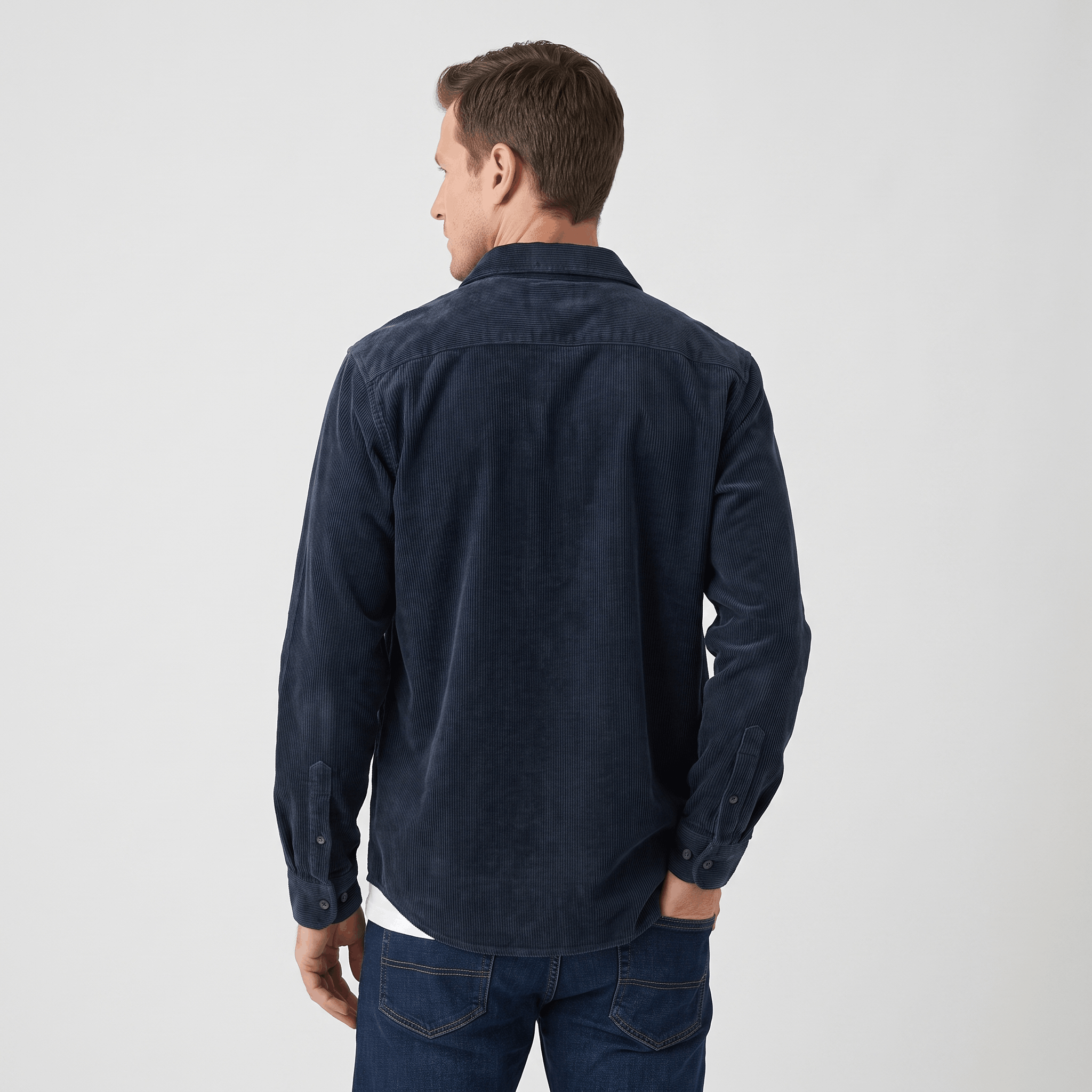 Dark navy washed corduroy button-up shirt in a regular fit, shown from the back with a clean, soft-ribbed texture.