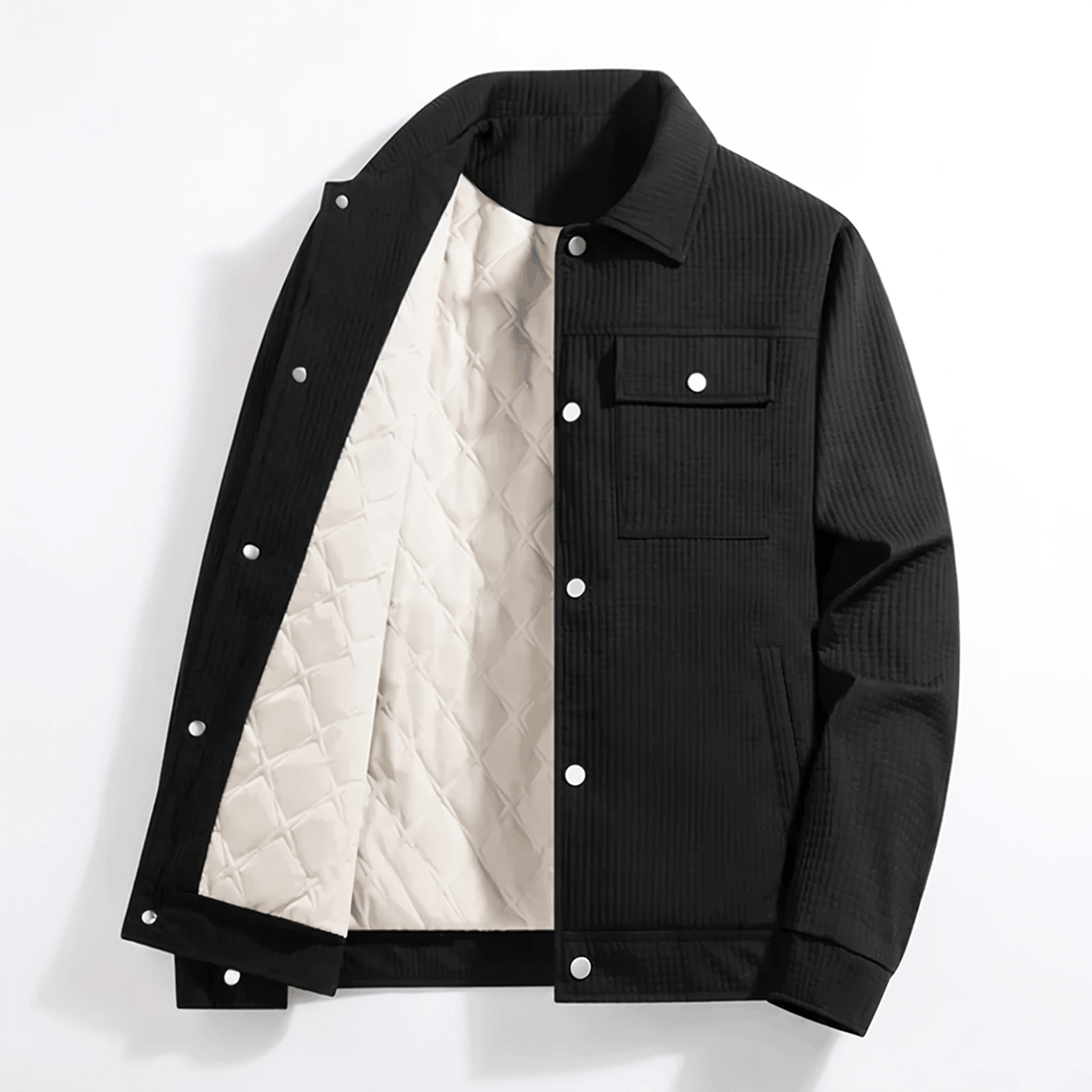 Black corduroy trucker jacket with a white diamond-quilted lining, snap-button front, and flap chest pockets.