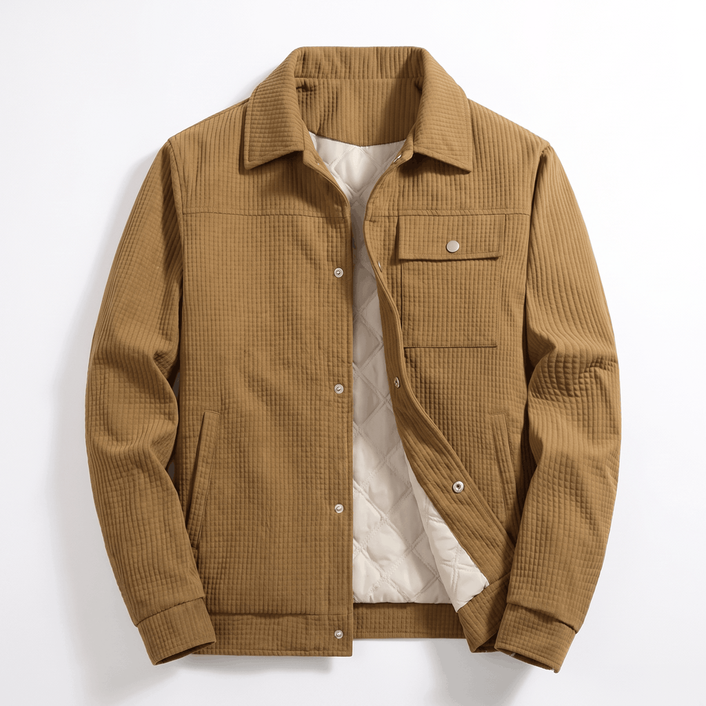 Tan corduroy trucker jacket with a snap-button front, dual chest pockets, and a white diamond-quilted interior lining.