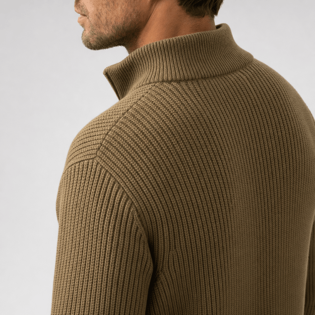Close-up back view of a brown ribbed knit quarter-zip sweater, showing the textured knit and raised collar.