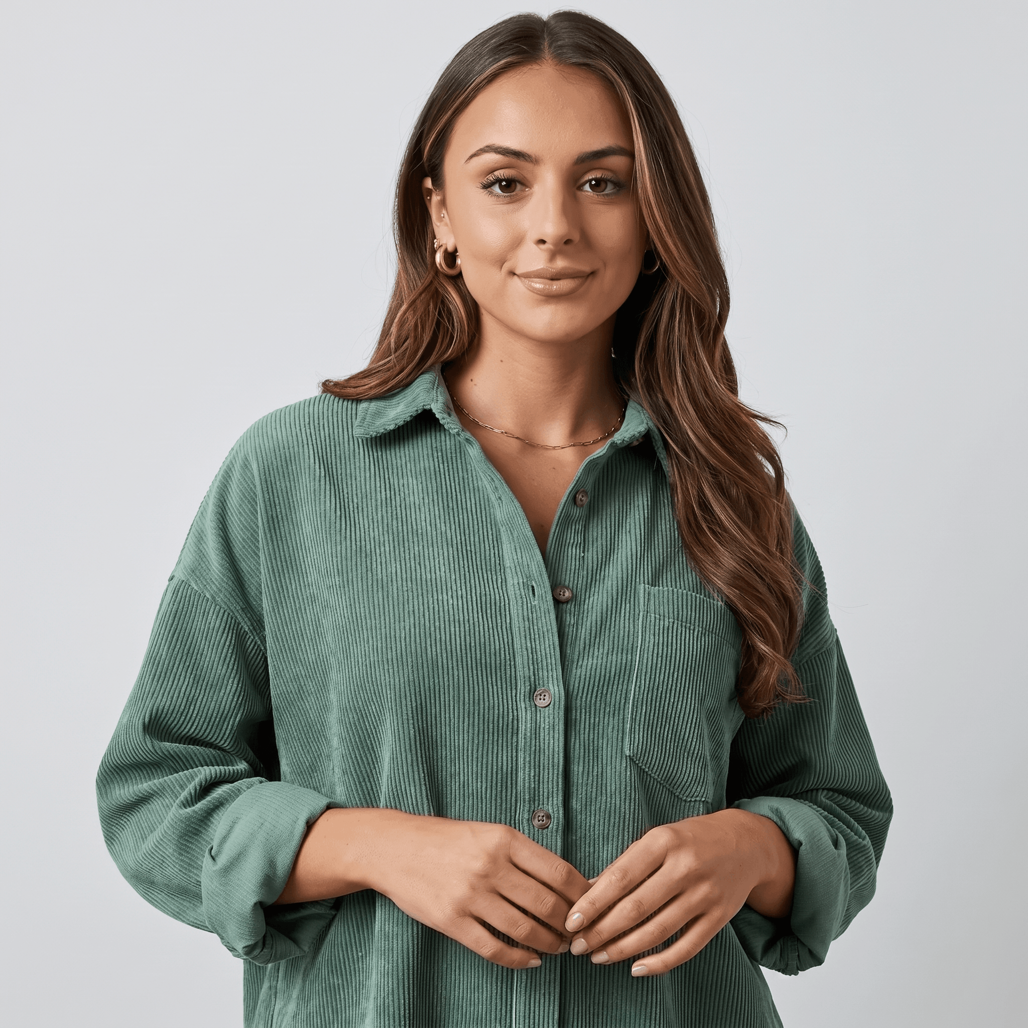 Sage green corduroy button-down shirt with an oversized drop-shoulder fit and classic point collar.