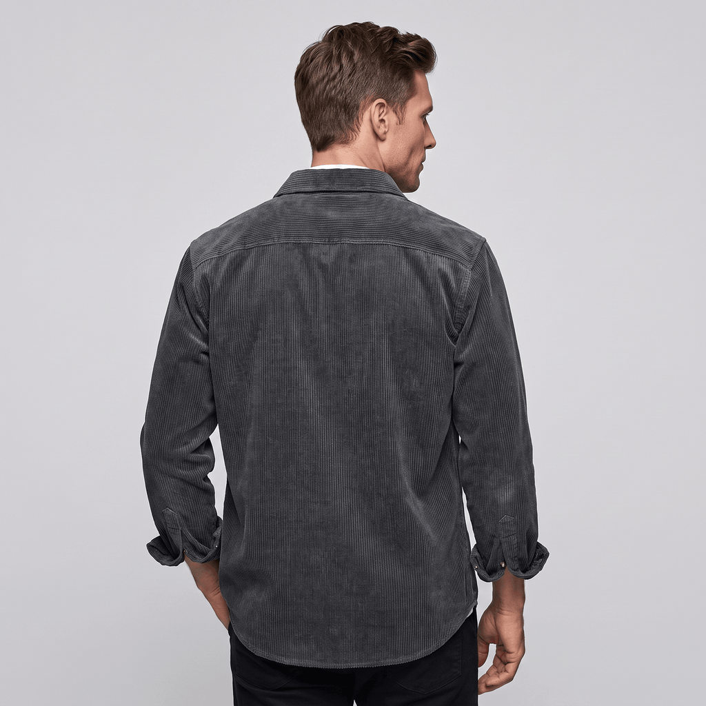 Charcoal grey cotton corduroy shirt featuring a relaxed fit, point collar, and long sleeves with buttoned cuffs.