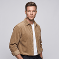 Tan cotton corduroy button-up shirt in a relaxed fit, layered over a white tee with a structured point collar.