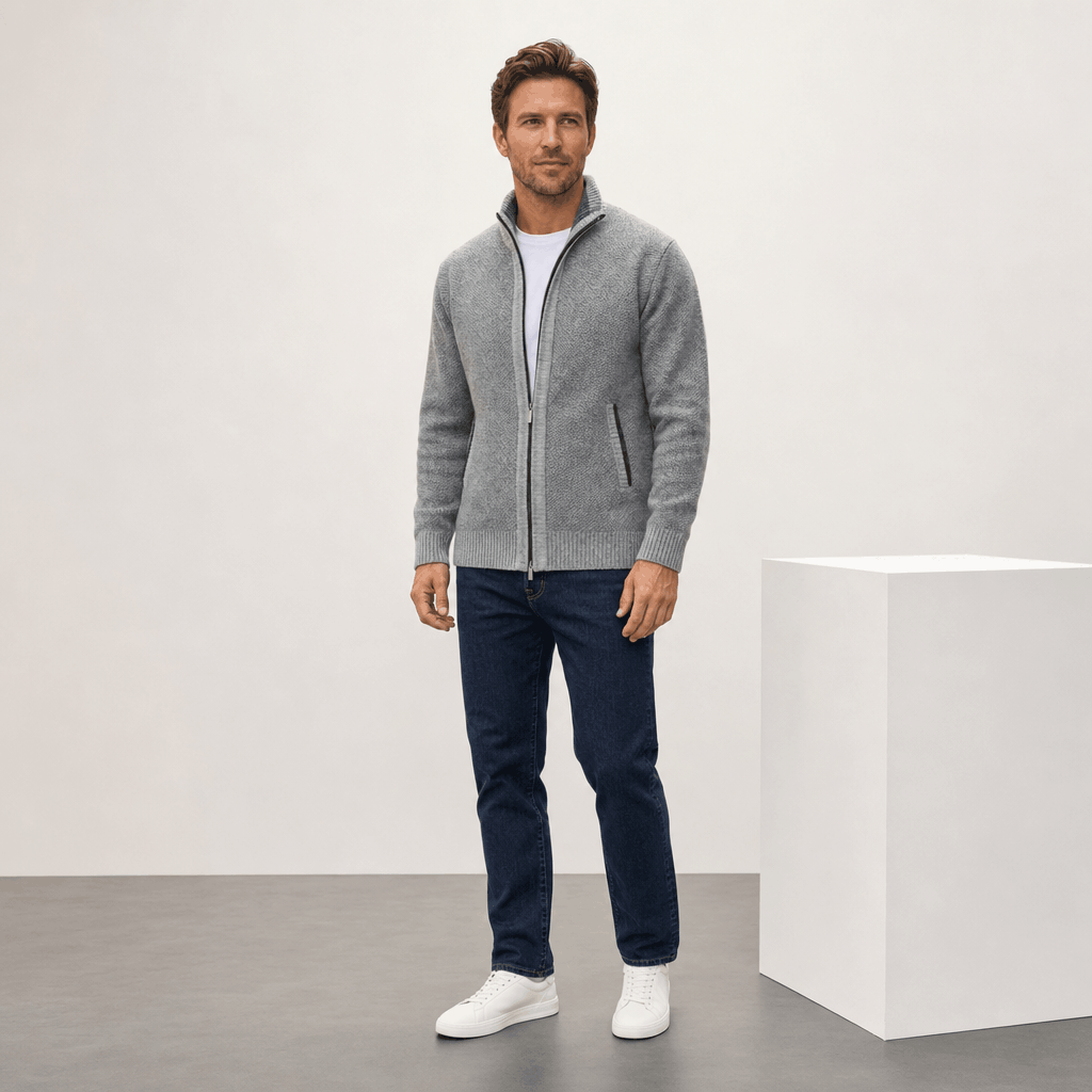 Male model wearing the light gray jacket with dark pants.