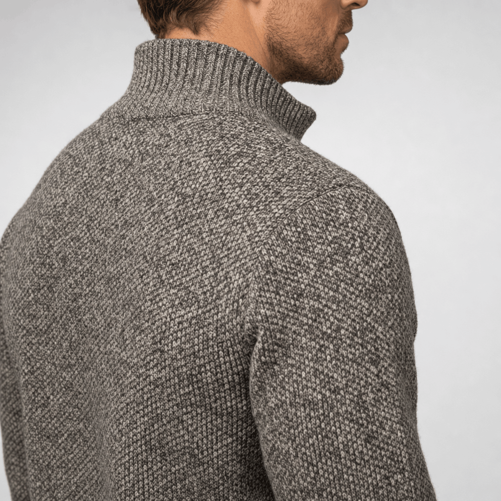 Close-up back view of the charcoal gray jacket, highlighting the textured fabric and raised collar.